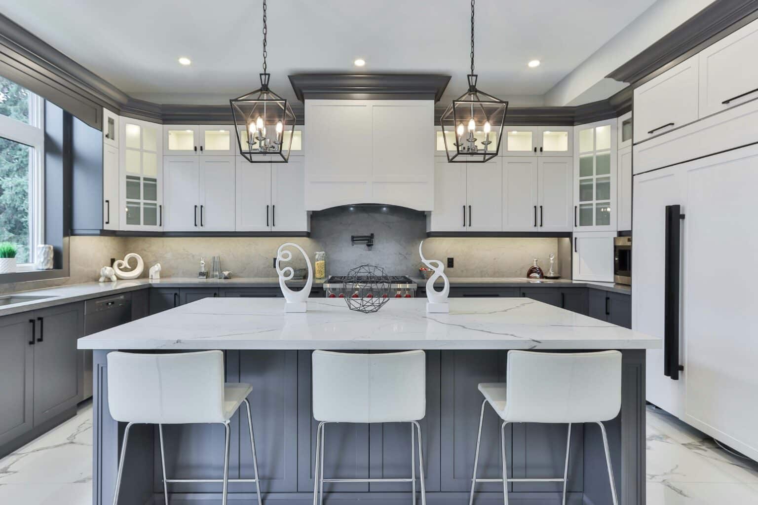 Modern kitchen with dusty blue and white color-scheme. home remodeling contractor in East Lyme